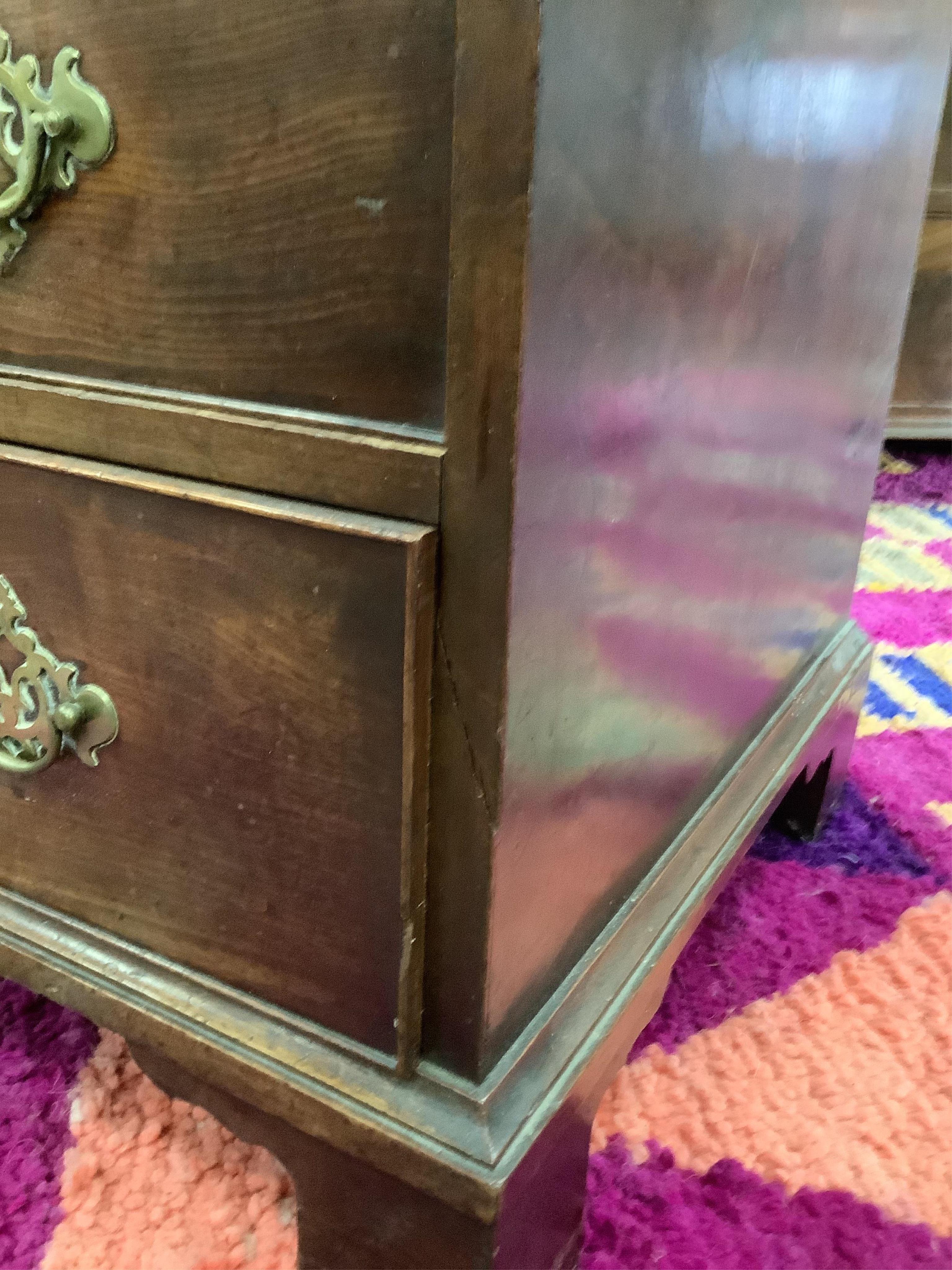 A small George III mahogany chest, fitted four long drawers, beneath a brushing slide, width 80cm, depth 49cm, height 81cm. Condition - fair
